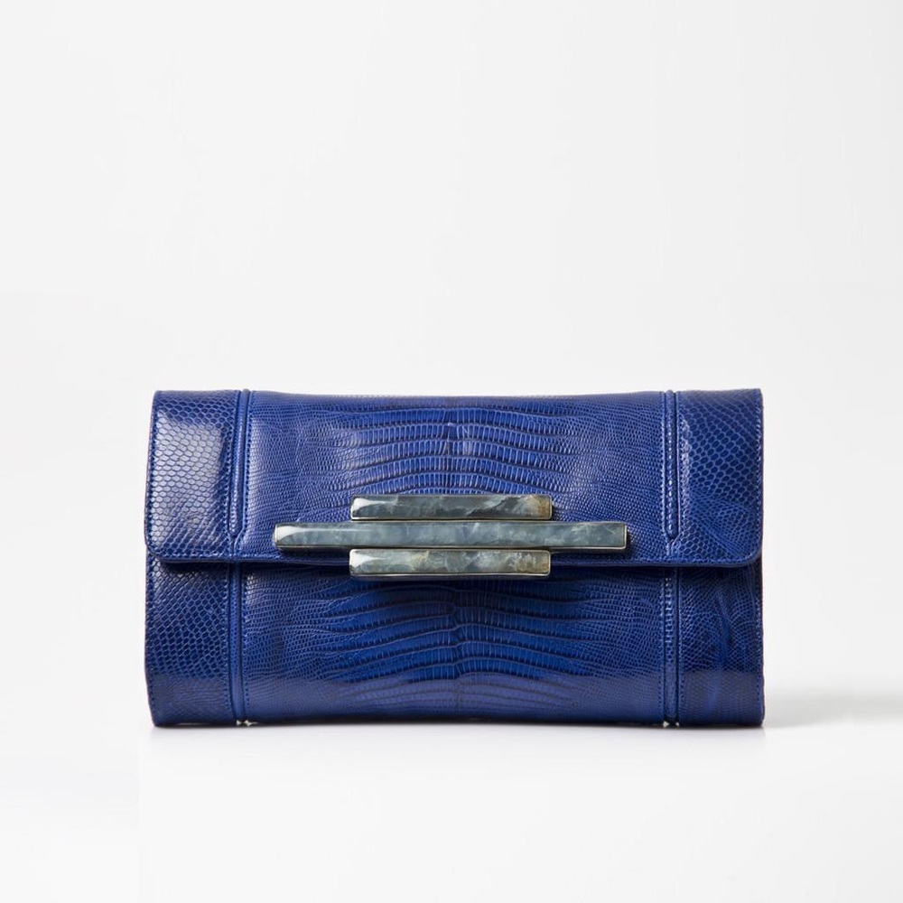 Electric blue lizard skin clutch with agate stone detail.